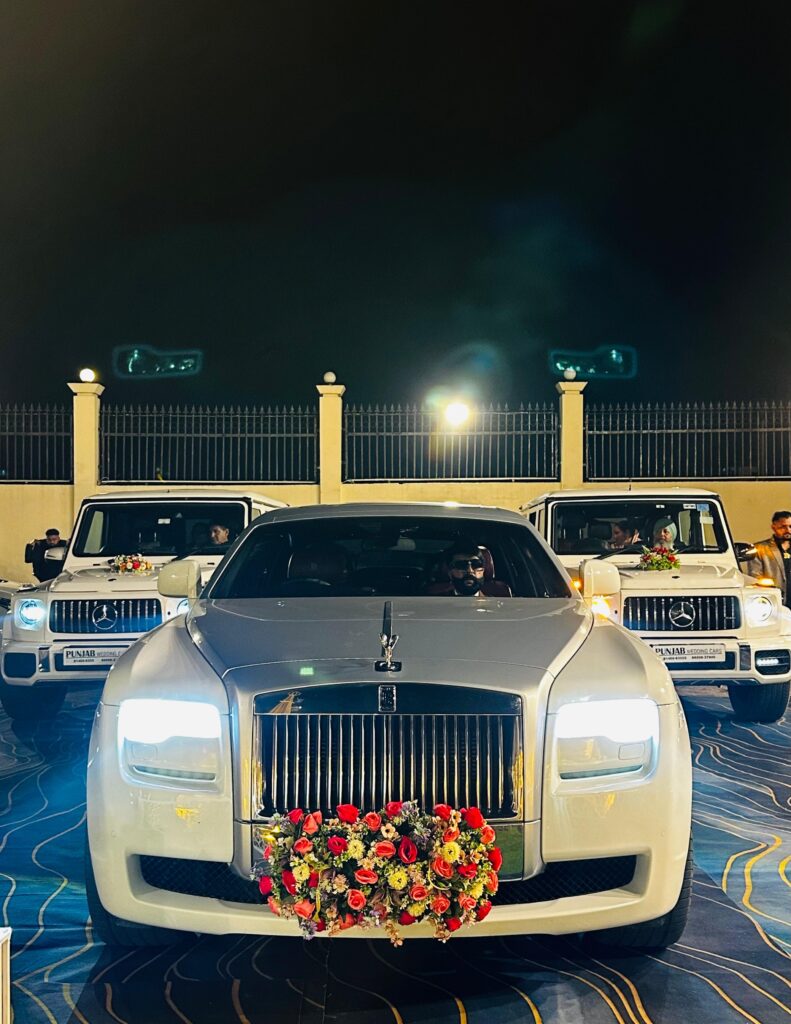 White Silver Rolls Royce Ghost series II rental on wedding by Punjab Wedding Cars Ludhiana jalandhar Chandigarh Amritsar Bathinda - Download Punjab Wedding Cars app for Android and Apple devices to get price list of rental cars In Punjab Chandigarh